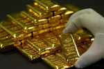 Refinitiv: инвесторы купят в 2021 году больше золота