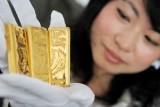 Гонконг начал продавать золото в юанях