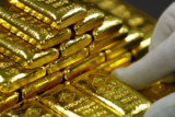 Китай: скандал с фальшивым золотом на 18,6 т.