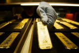 Падение спроса в Китае не повлияло на цену золота
