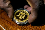 Золотые монеты в Зимбабве - храбрая попытка властей