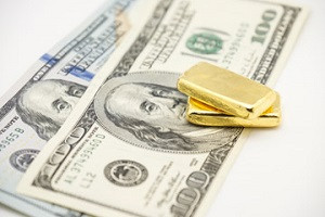 За 100 лет доллар США обесценился к золоту на 99%