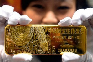 Китай: больше золота - меньше долларов
