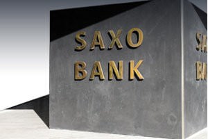 Saxo Bank: Полсон не потерял интерес к золоту